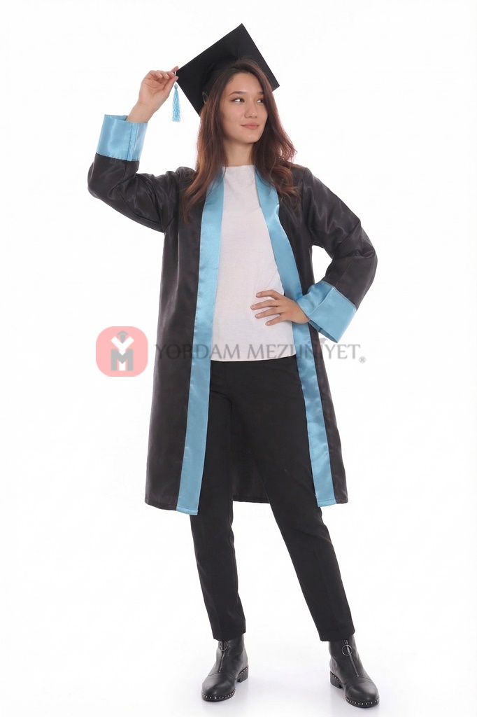 Graduate in cap and gown pose